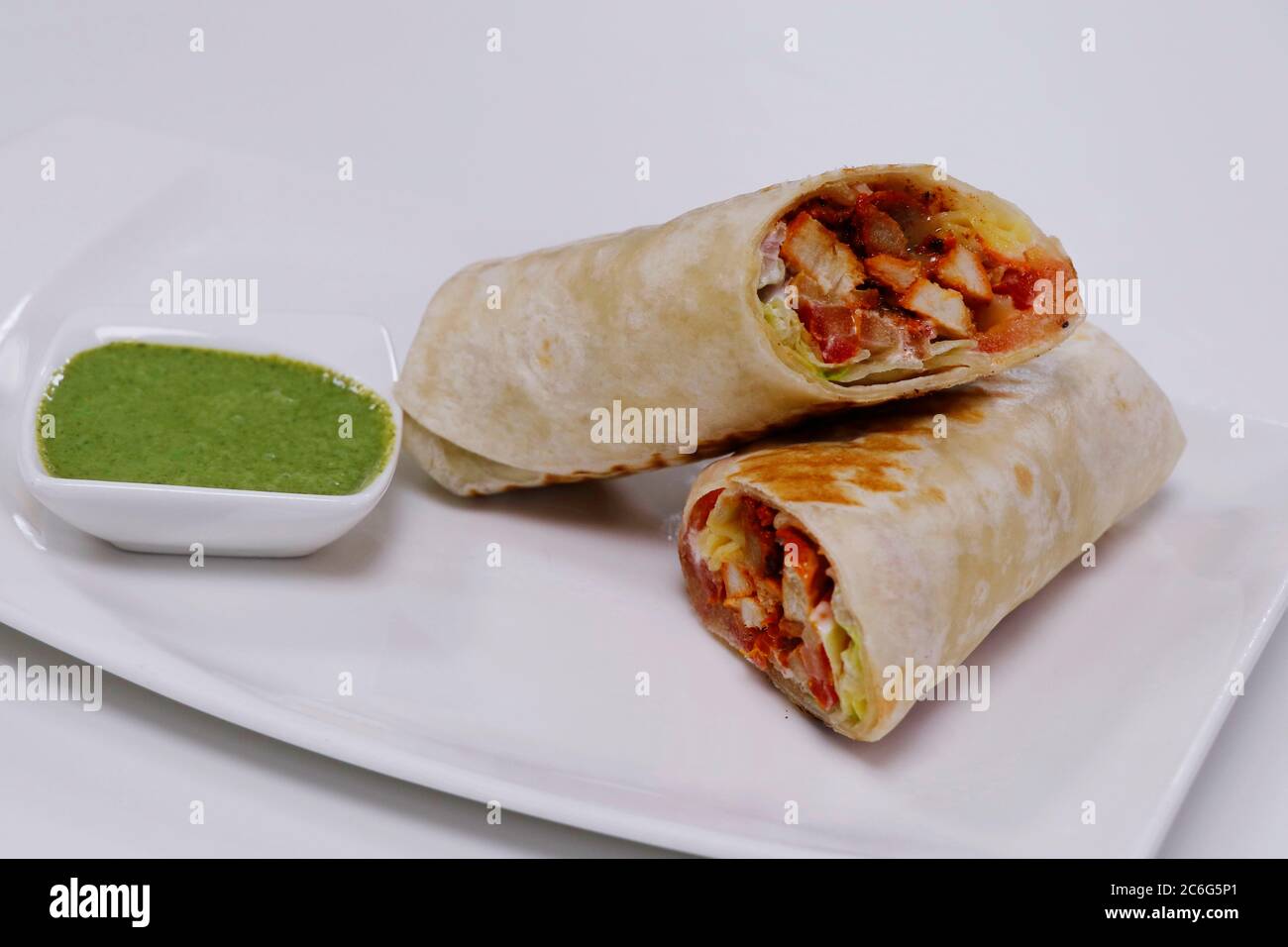 chicken tikka wraped in tortilla flat bread, served with mint chutney