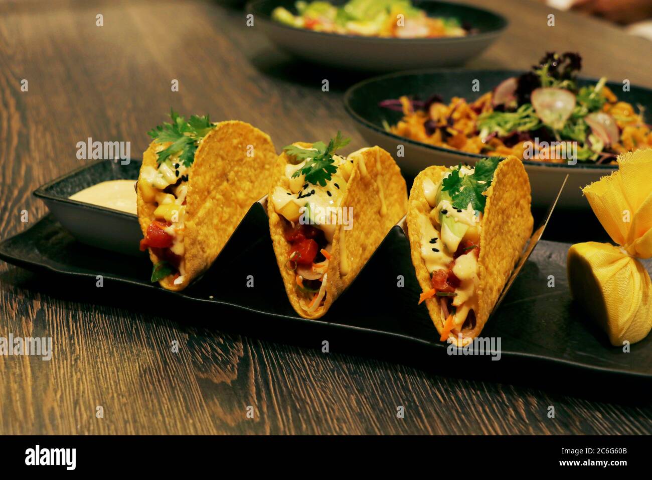 traditional Mexican dish taco,consisting of a small handsized corn or