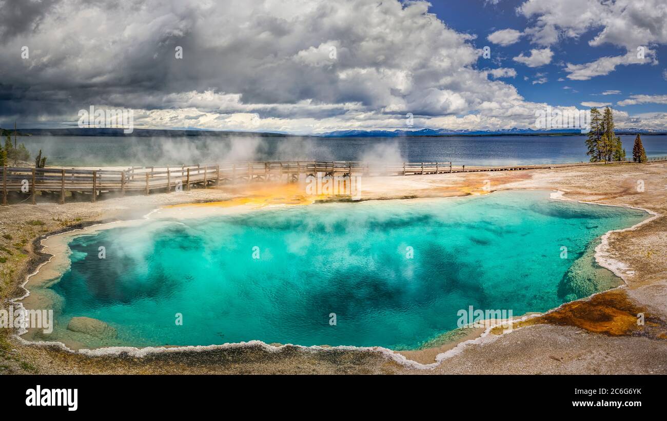 Beautiful evening in West Thumb Geyser Basin with Yellowstone Lake in the bacground. Stock Photo