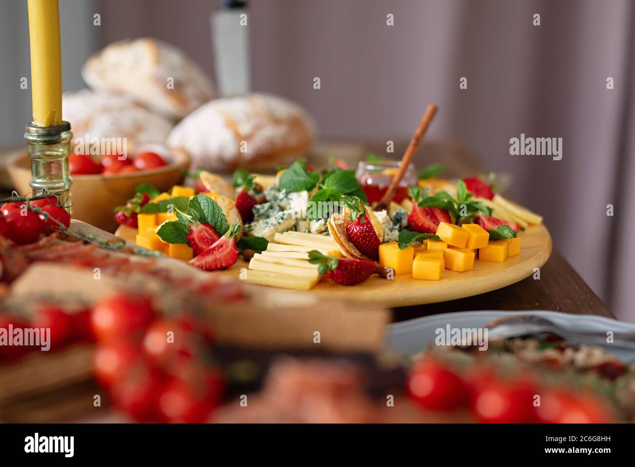 colorful and vibrant food , assorted mint, cheese and fruit, diced food