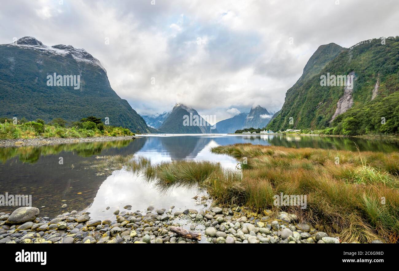Mitre Peak, reflection in water, Milford Sound, Fiordland National Park, Te Anau, Southland, South Island, New Zealand Stock Photo