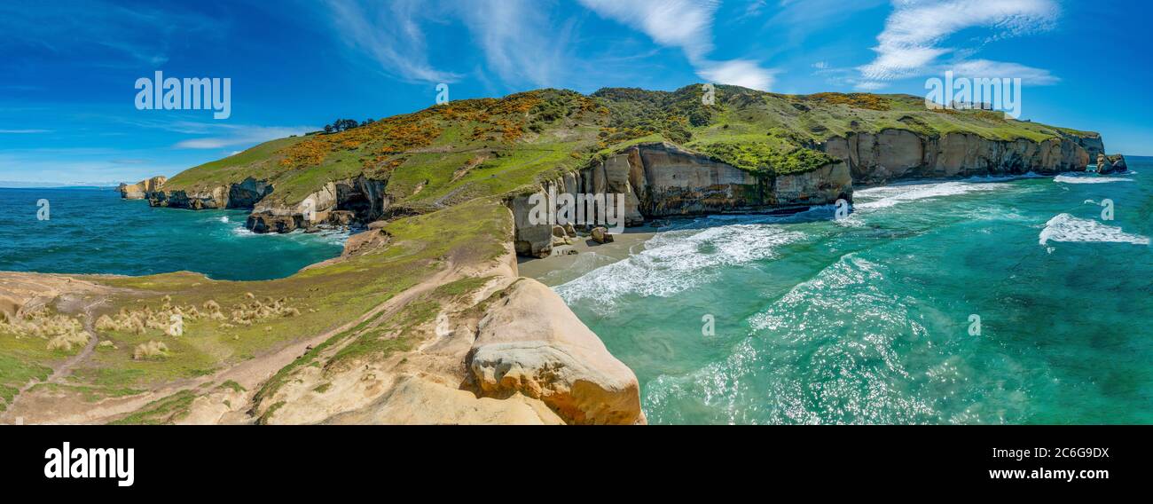 Rocky cliffs of sandstone rocks, Tunnel Beach, Otago, South Island, New Zealand Stock Photo