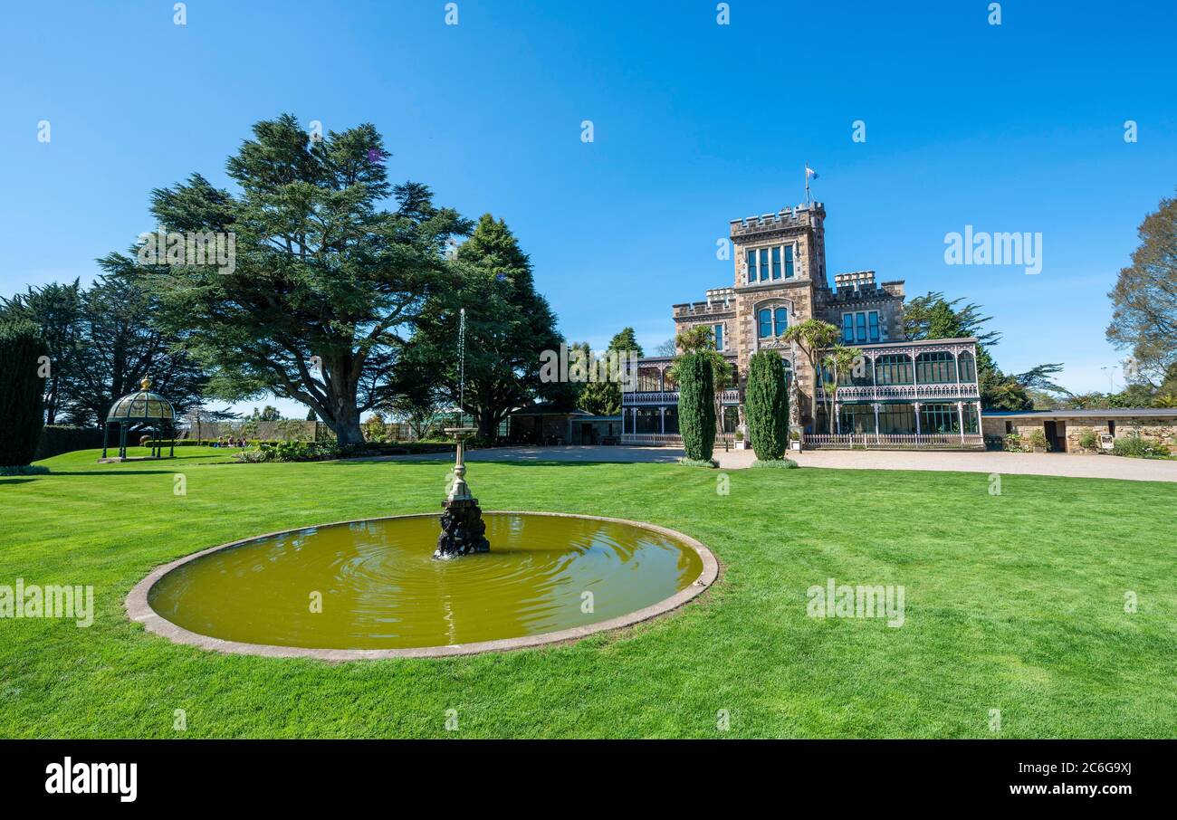 Larnach Castle, Fountain and Castle, Dunedin, Otago Peninsula, South Island, New Zealand Stock Photo