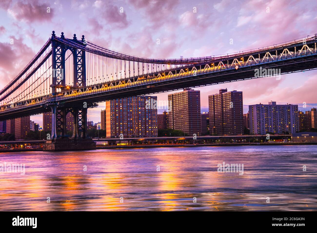 Beautiful Manhattan Bridge from Brooklyn to New York City seen at sunset Stock Photo