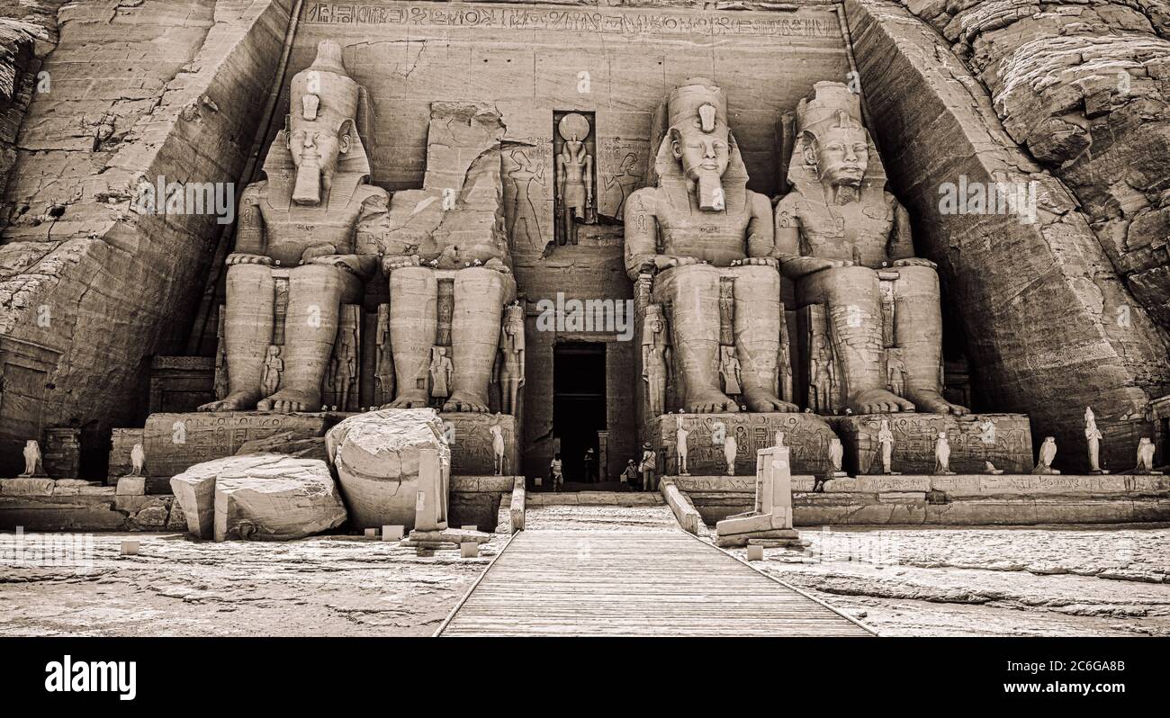 The Temple at Abu Simbel statues represent Ramesses II, seated on a