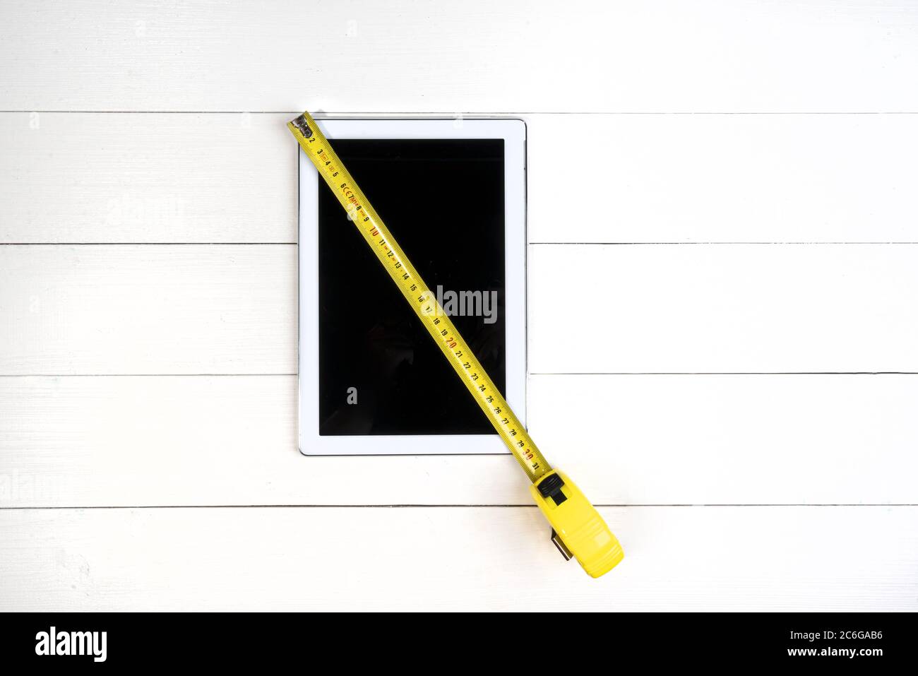 measurement of the screen size of a tablet Stock Photo Alamy