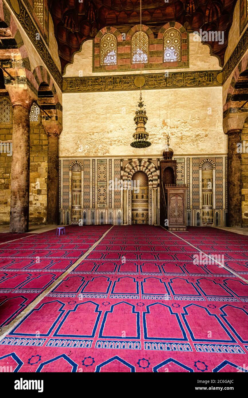 The Prayer hall showing the Mihrab (prayer niche) and Minbar (pulpit) in the Al-Nasir Muhammad Mosque in Cairo Stock Photo