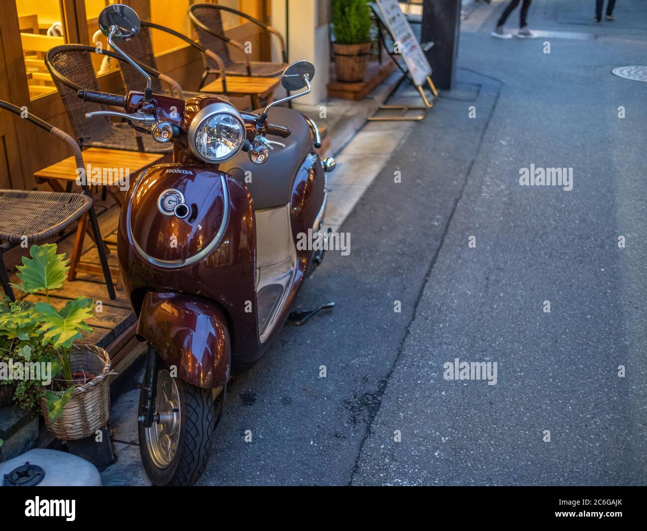 Vespa scooter in the street sidewalk of Shimokitazawa neighborhorhood, Tokyo, Japanp Stock Photo