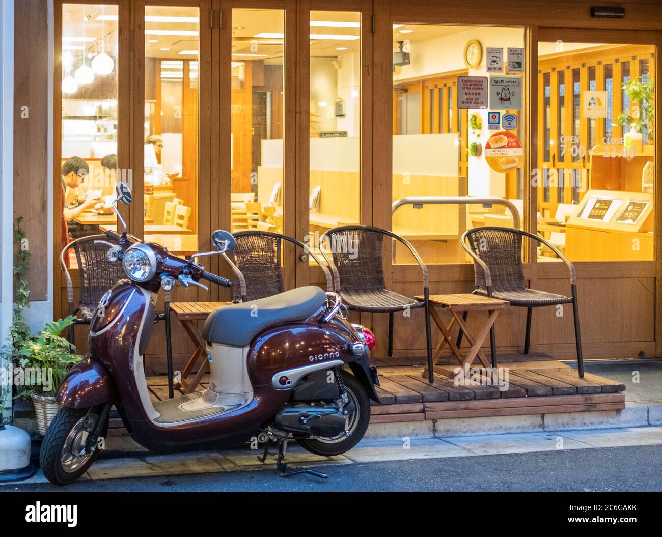 Vespa scooter in the street sidewalk of Shimokitazawa neighborhorhood, Tokyo, Japanp Stock Photo