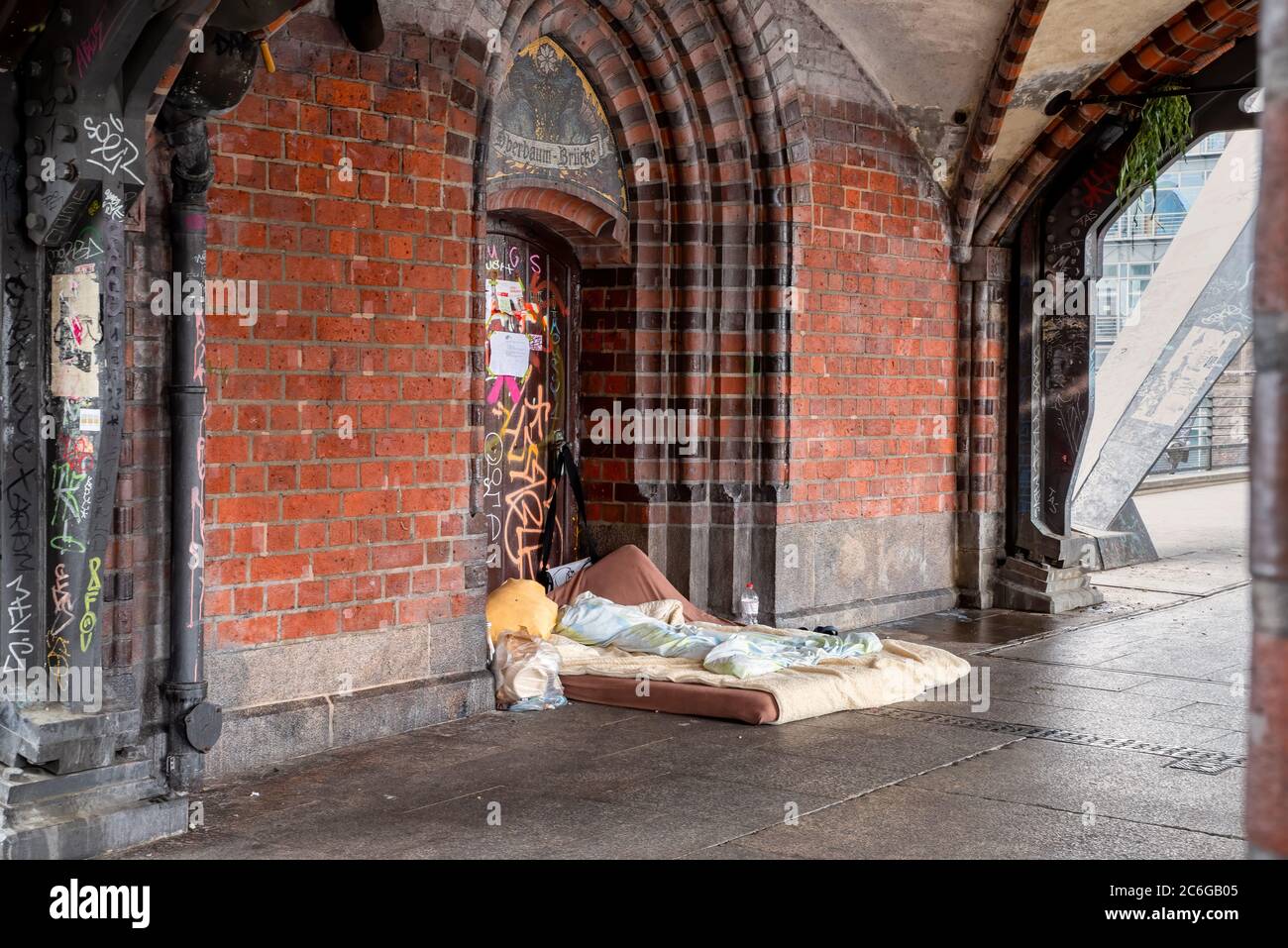 Berlin, Germany, 06/14/2020: Bed of a homeless person in the passage of the Oberbaumbruecke in Berlin, Germany Stock Photo