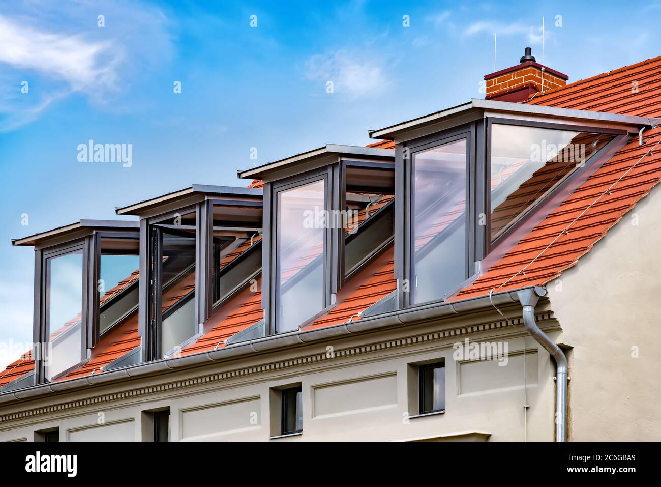 Four modern dormer window made of glass and metal. Lateral glass panels Stock Photo