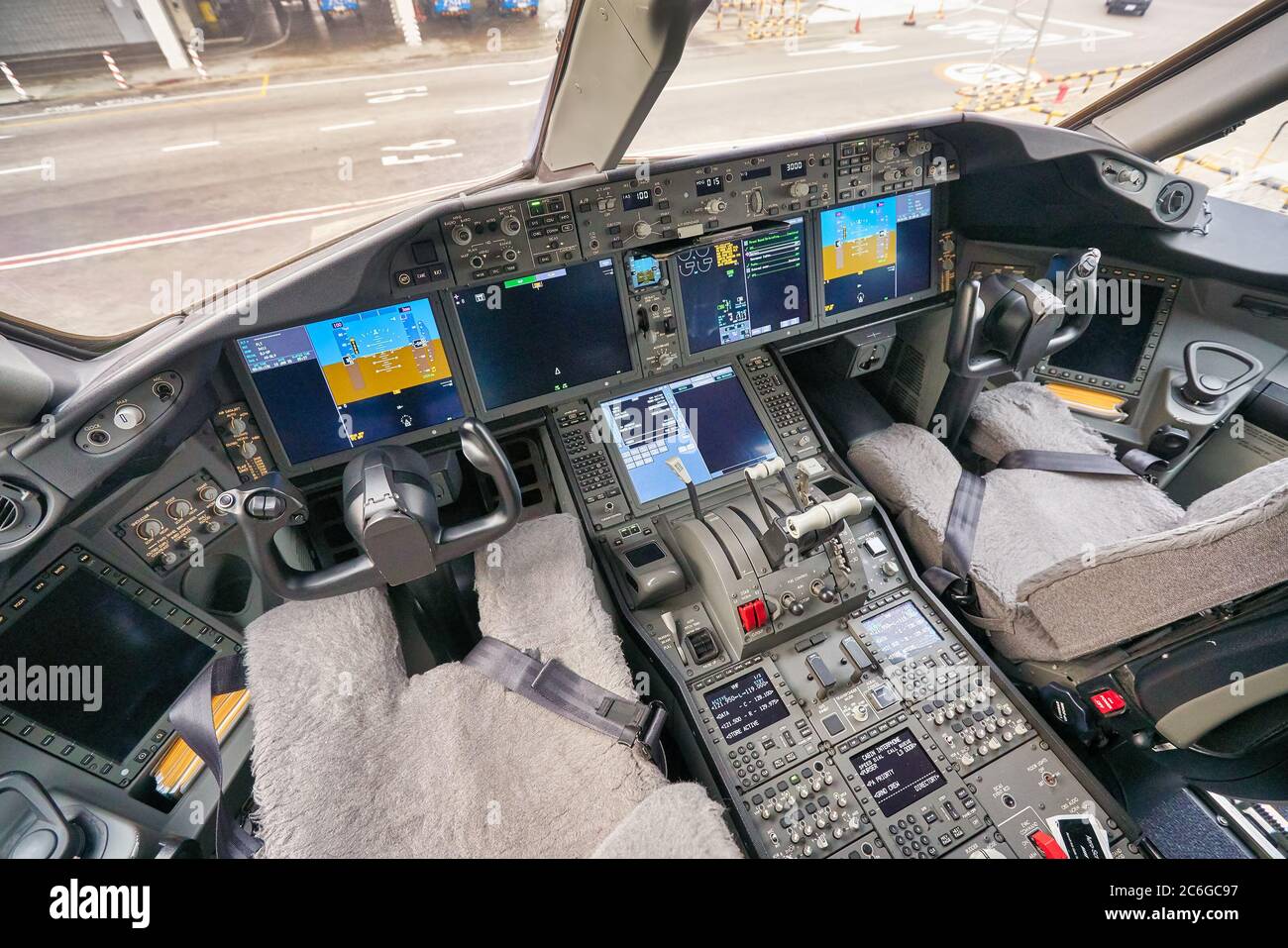 BANGKOK, THAILAND - CIRCA JANUARY, 2020: interior shot of Etihad Airways Boeing 787 Dreamliner cockpit at Suvarnabhumi Airport. Stock Photo