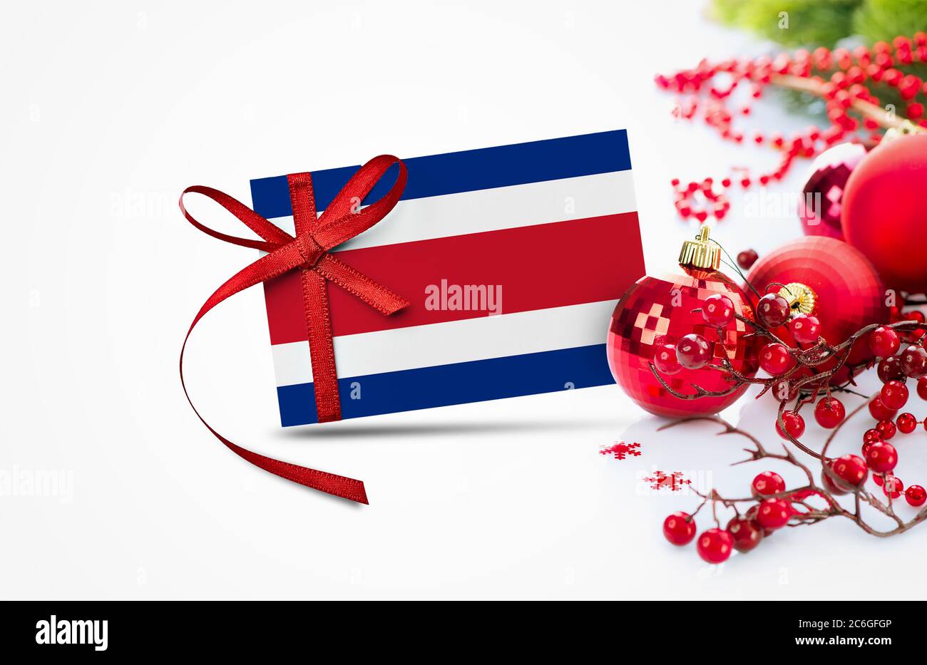 Costa Rica For Christmas 2022 Costa Rica Flag On New Year Invitation Card With Red Christmas Ornaments  Concept. National Happy New Year Composition Stock Photo - Alamy