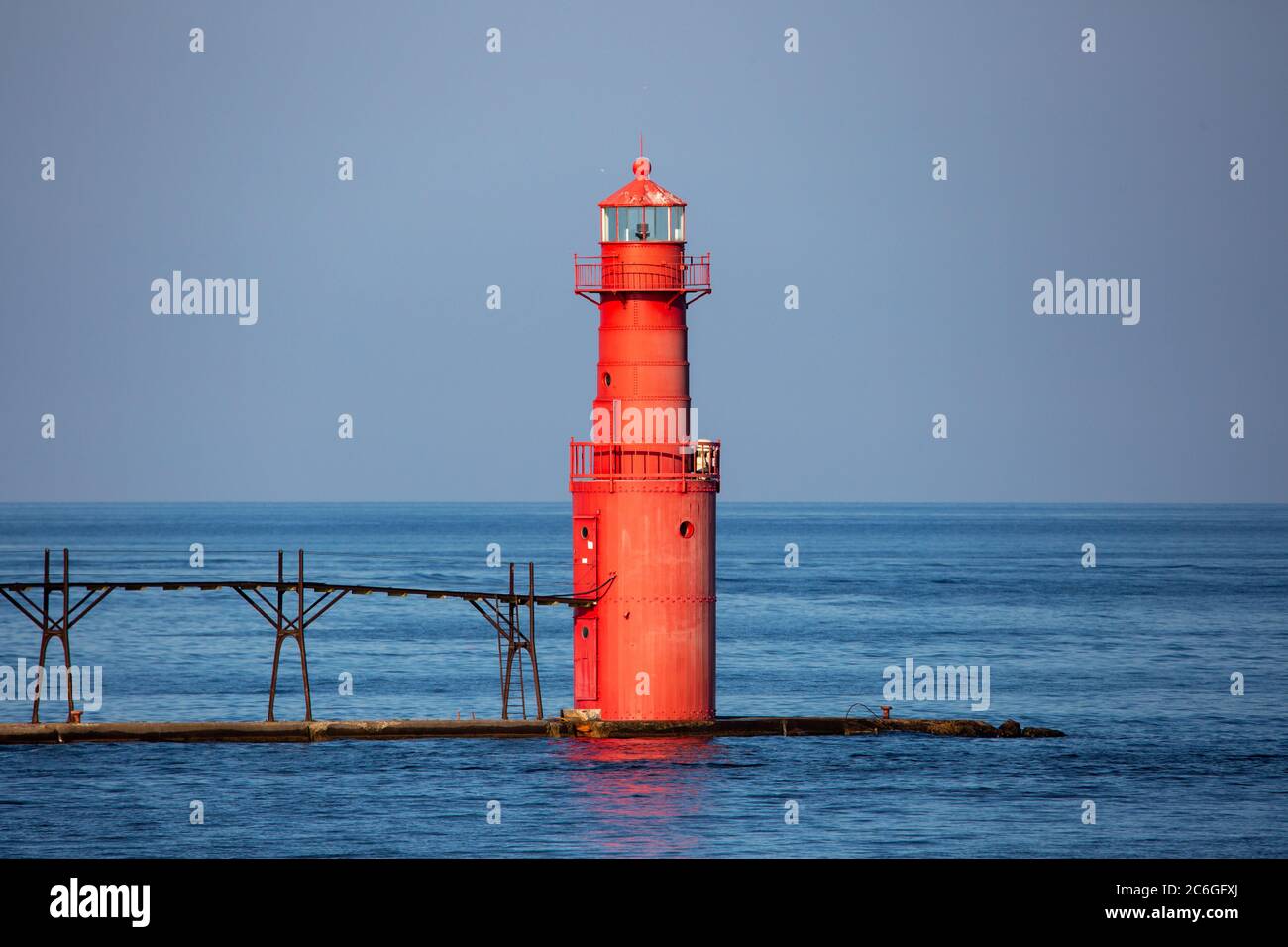 Algoma Pierhead Lighthouse in Algoma, Wisconsin in the summer with a blue sky, horizontal Stock Photo