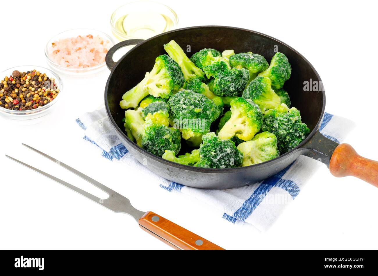 Frozen broccoli cabbage inflorescences in frying pan Stock Photo Alamy