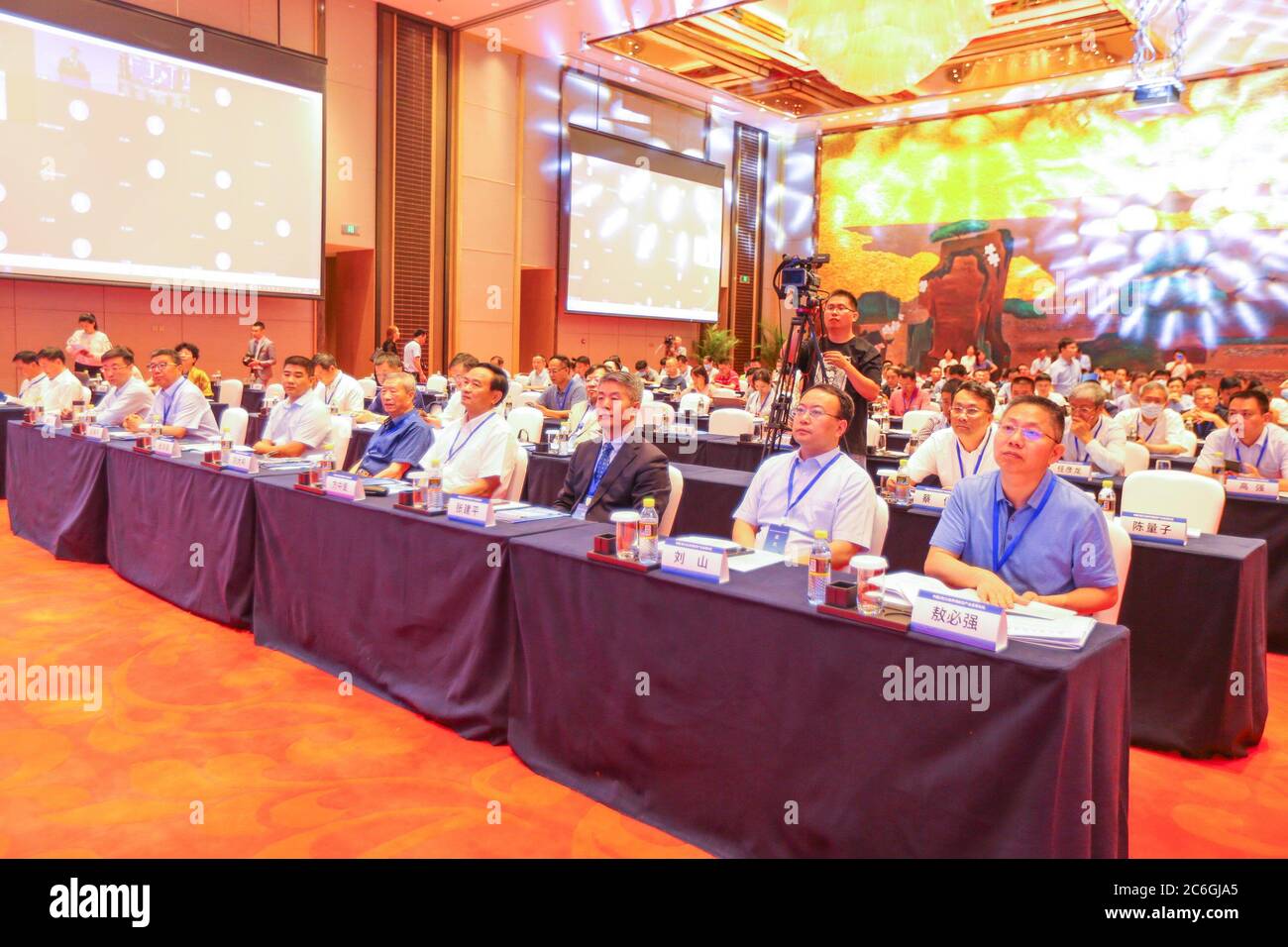 Govenment officials and business heads attend the 2020 Haikou Business and Investment Project Group Signature Ceremony held in Haikou city, south Chin Stock Photo
