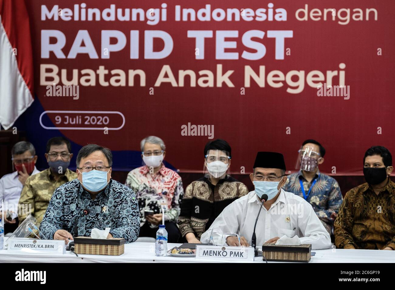 Minister of Research and Technology, Bambang Permadi Soemantri Brodjonegoro (left) andCoordinating Minister for Human Development and Culture of the Republic of Indonesia, Muhadjir Effendy (right) during the launched a kit RI-GHA COVID-19 rapid test in Jakarta, indonesia, on July 9, 2020. The rapid test was to detect early Coronavirus (COVID-19) infections in government employees in order to prevent the spread. The test was also to mark a new normal order by implementing strict health protocols. (Photo by Evan Praditya/INA Photo Agency/Sipa USA) Stock Photo