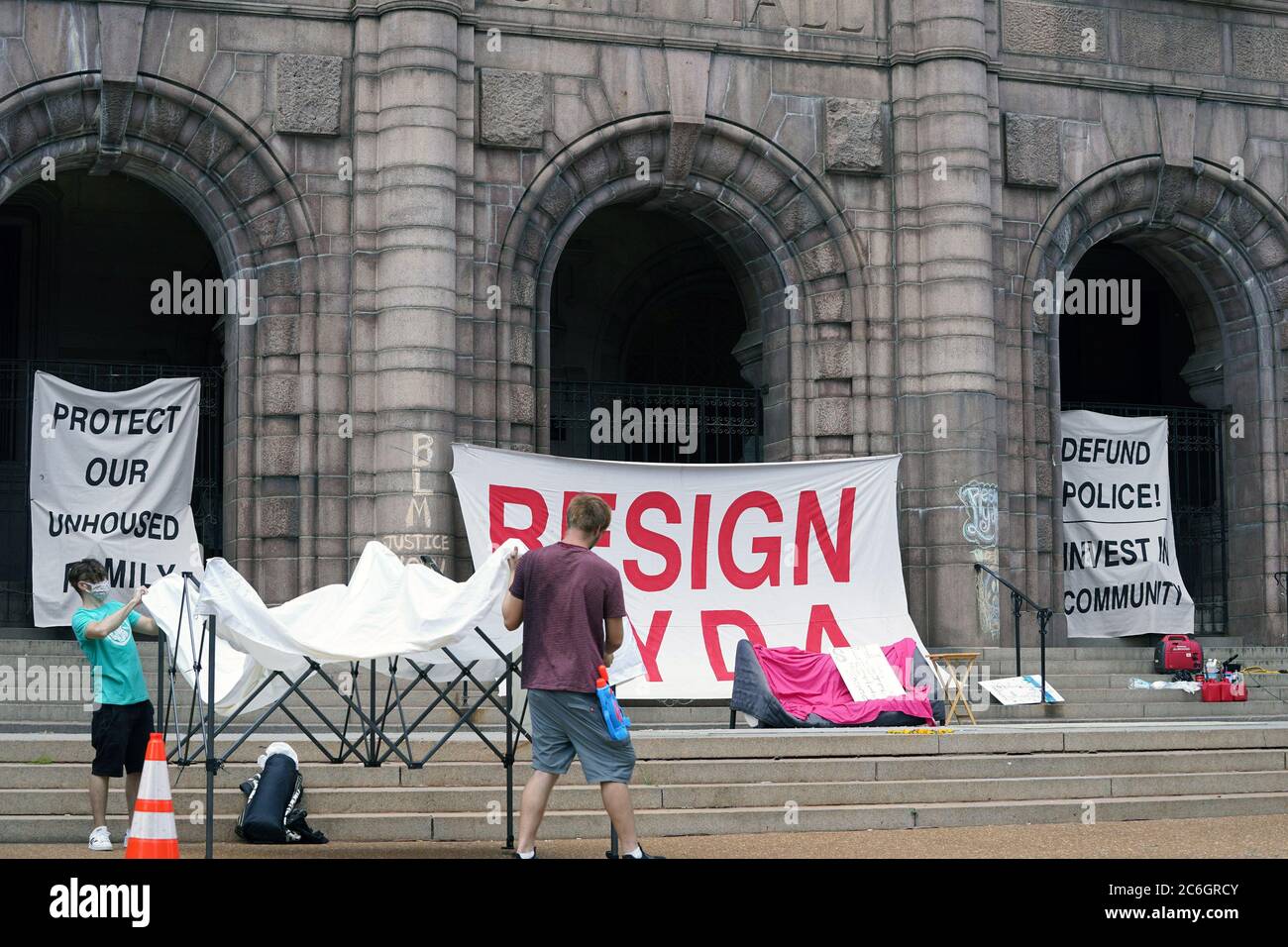 St. Louis, United States. 09th July, 2020. Protesters set up tents outside of St. Louis City Hall on Thursday, July 9, 2020. The group, Occupy City Hall STL, said they will stay on the grounds until St. Louis Mayor Lyda Krewson resigns. Petitions with 60 thousand signatures have been collected, for her to resign. The group is angry that Krewson read peoples names and addresses of those that want to defund the police, during her daily facebook feed. Photo by Bill Greenblatt/UPI Credit: UPI/Alamy Live News Stock Photo