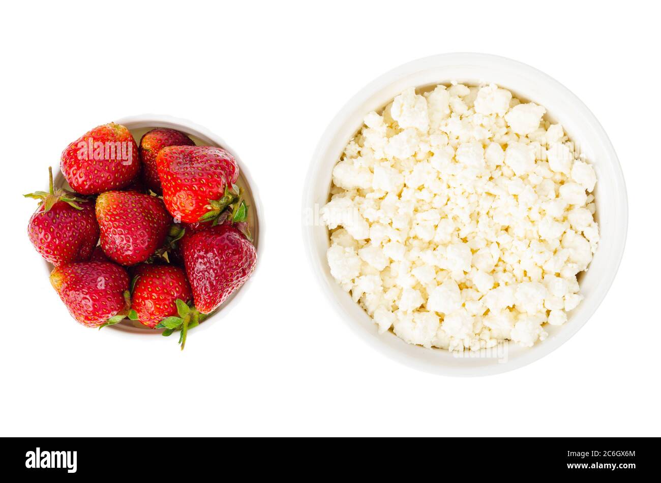 Healthy food. Fresh homemade cottage cheese and strawberries Stock