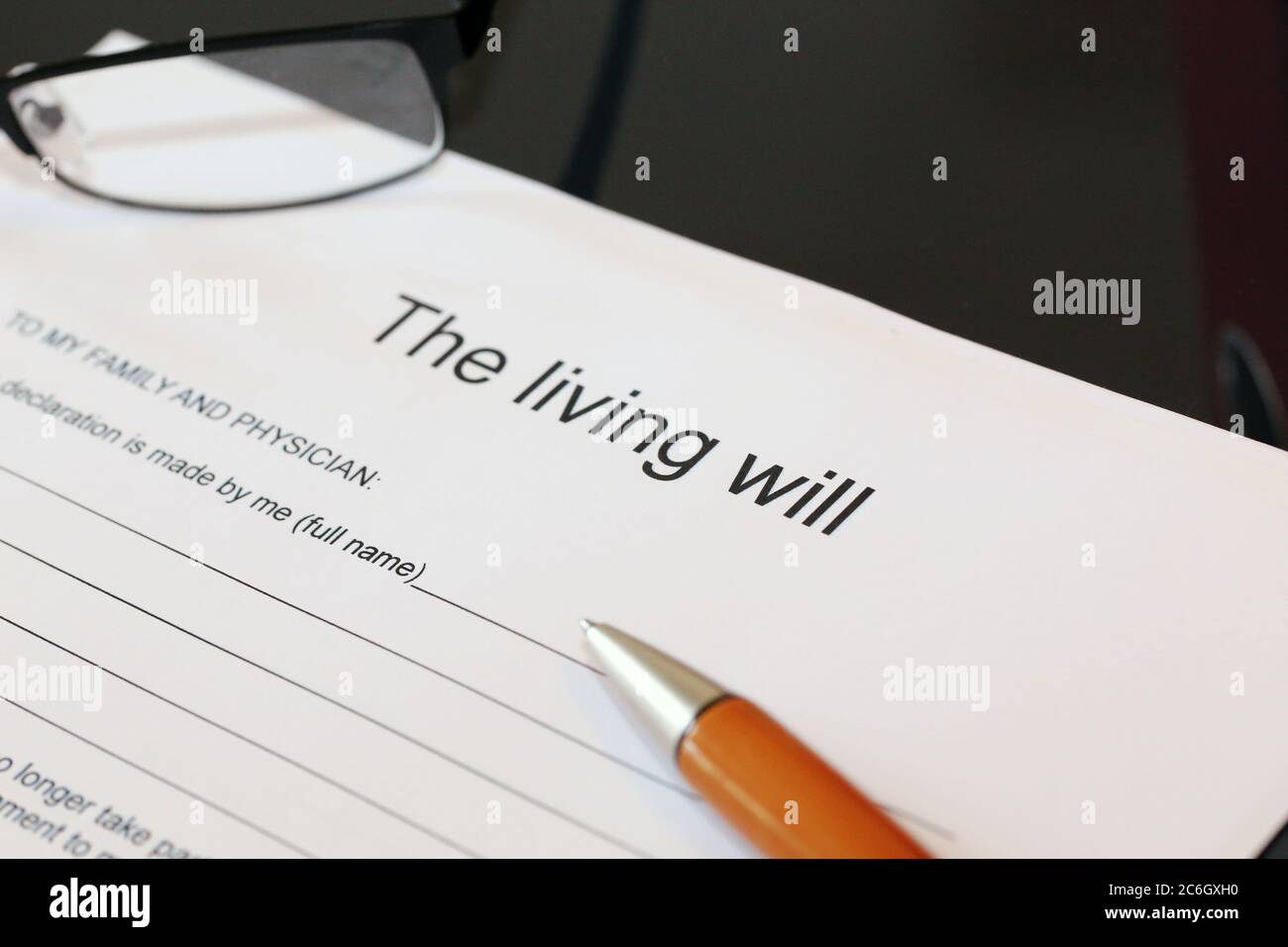 Symbol image: Blank form of the living will on a desk Stock Photo