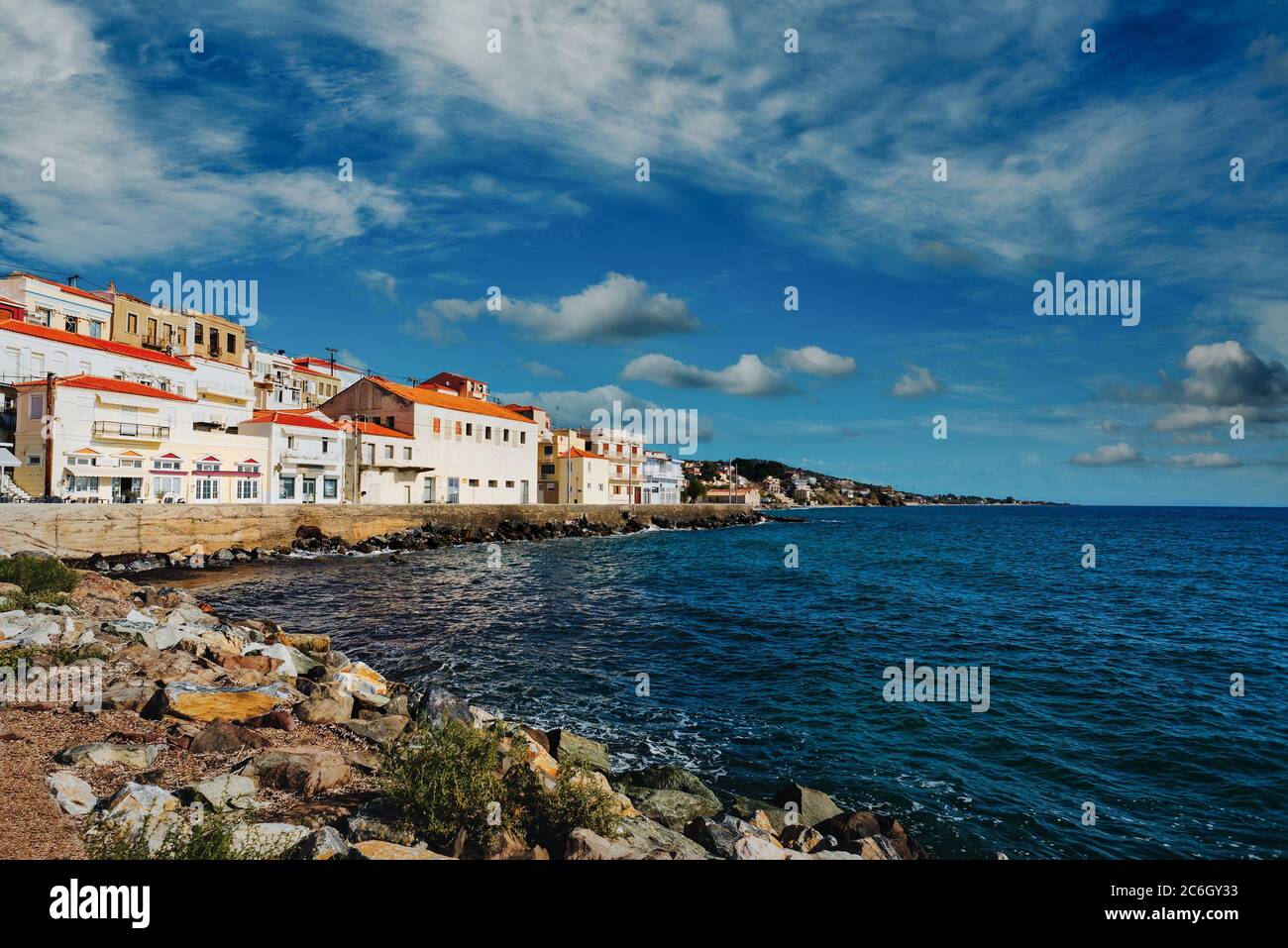 Scenic coastal village of Plomari (Plomarion) on beautiful island Lesvos (Lesbos) in Greece. Stock Photo