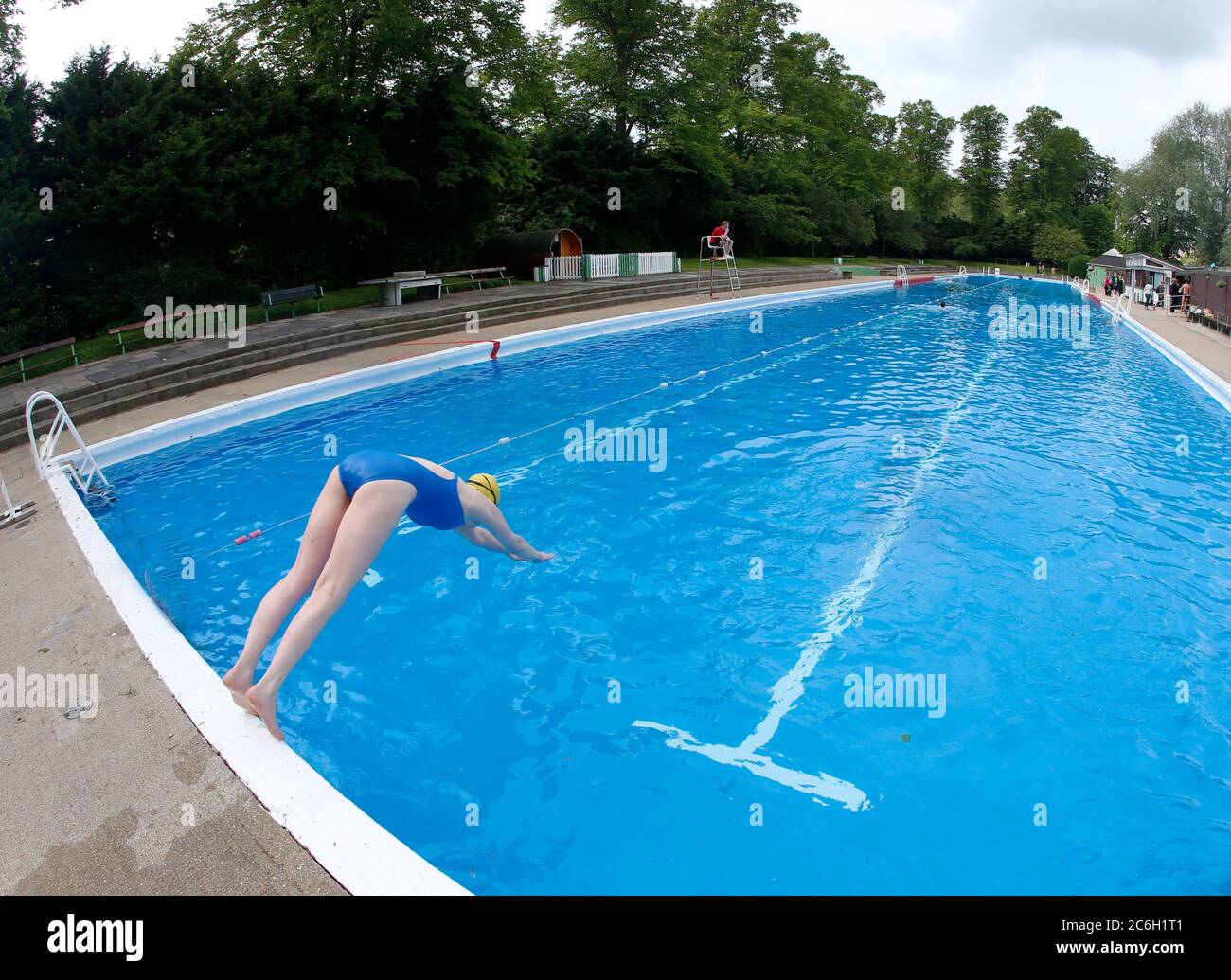 Cambridge, UK. 10th July 2020 The UK government announced that outside swimming pools can open from Saturday 10th July 2020. Jesus Green Lido in Cambridge hopefully is one of those, pictured here in busier times.  Credit: Headlinephoto/Alamy Live News Stock Photo