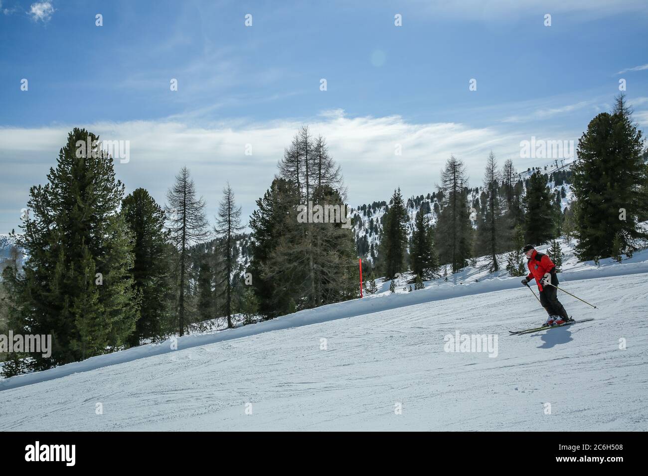 KREISCHBERG, MURAU, AUSTRIA - MARCH 15, 2017: Man skier running downhill on sunny alpine slope Stock Photo