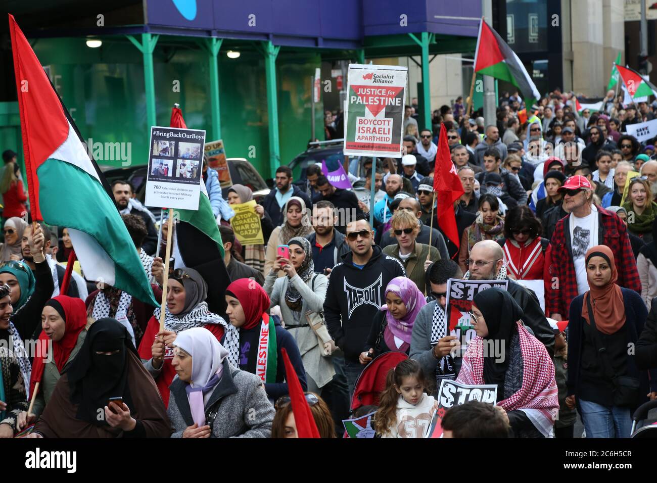 Pro-Palestine supporters march along King Street in Sydney Stock Photo