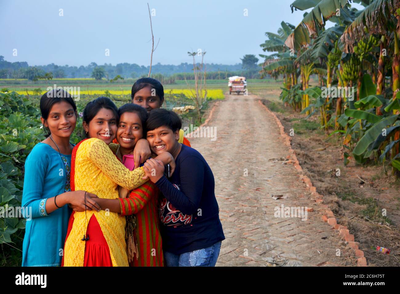 A group beautiful Indian teenage girls in a group in the fields, selective focusing Stock Photo