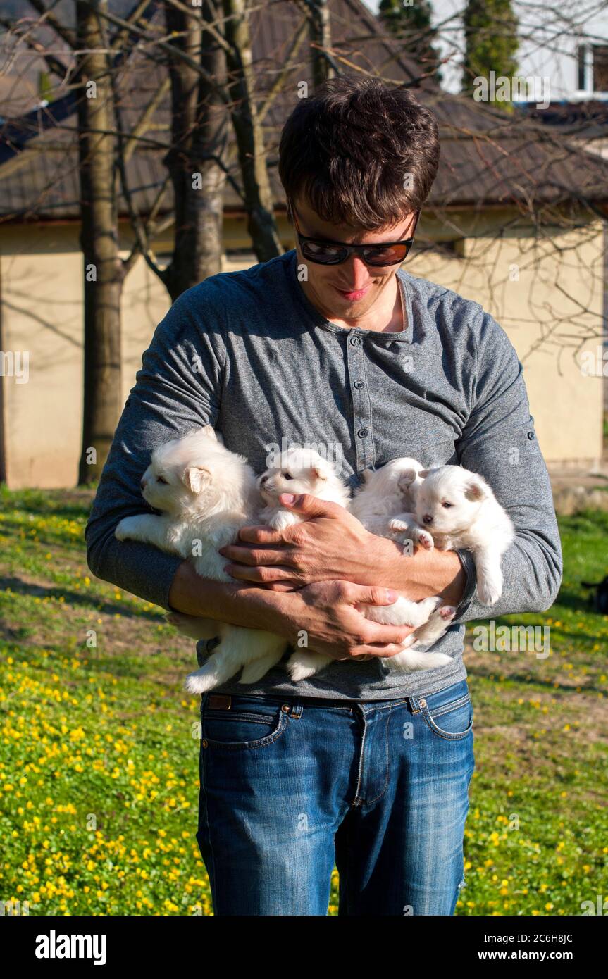 young man holding his best friend 