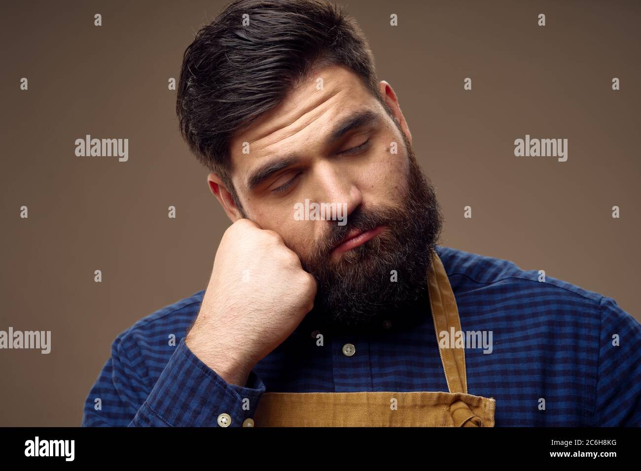 Cute guy with a bushy beard is sleeping Stock Photo - Alamy