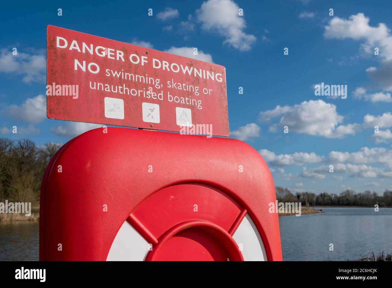 Detailed view of an emergency life ring and warning sign, for use in a