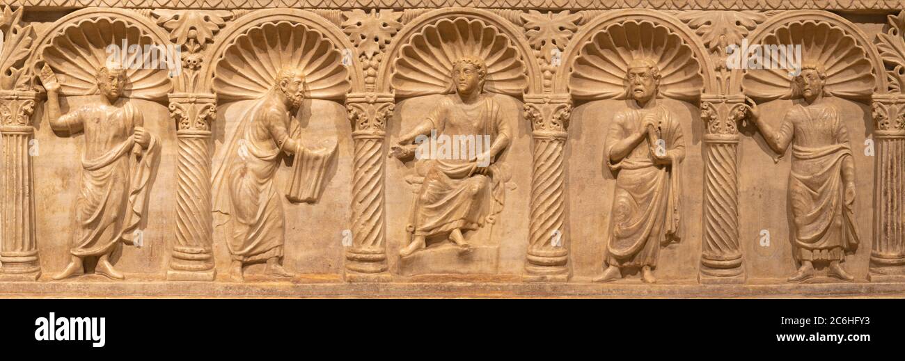 RAVENNA, ITALY - JANUARY 27, 2020: The relief from old christian tomb (Christ holding out the Law scroll to St. Paul). Stock Photo