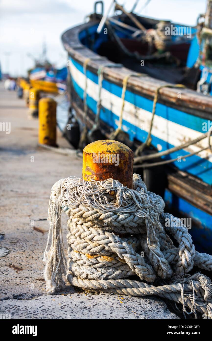 Old rope tied wooden pole hi-res stock photography and images - Alamy