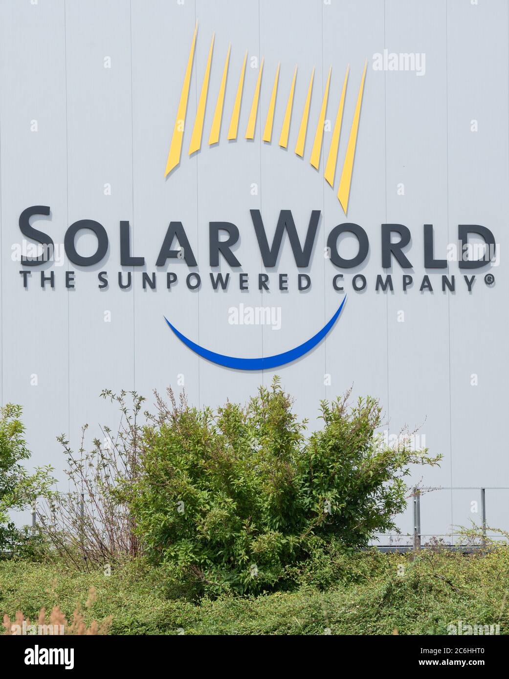 Freiberg, Germany. 10th July, 2020. The logo of the insolvent solar module manufacturer Solarworld hangs on a hall. The Swiss Meyer Burger Technology AG wants to start production of solar cells and solar modules in Saxony and Saxony-Anhalt. Credit: Sebastian Kahnert/dpa-Zentralbild/dpa/Alamy Live News Stock Photo