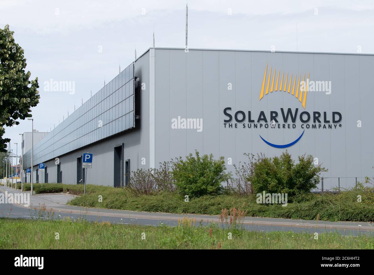 Freiberg, Germany. 10th July, 2020. The logo of the insolvent solar module manufacturer Solarworld hangs on a hall. The Swiss Meyer Burger Technology AG wants to start production of solar cells and solar modules in Saxony and Saxony-Anhalt. Credit: Sebastian Kahnert/dpa-Zentralbild/dpa/Alamy Live News Stock Photo