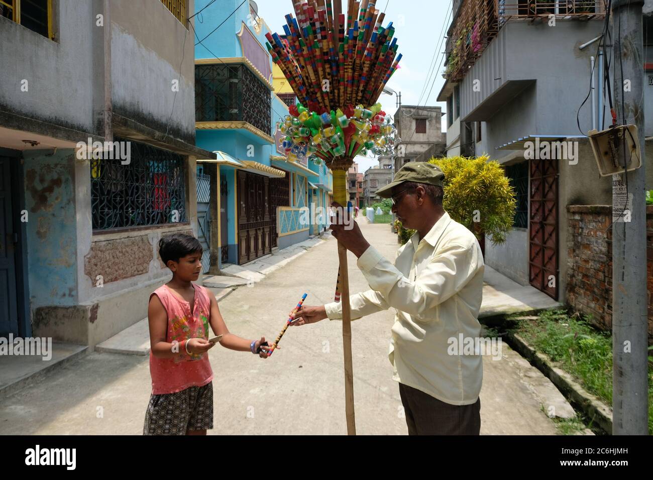 Kolkata, India. 09th July, 2020. A flute seller is roaming around by