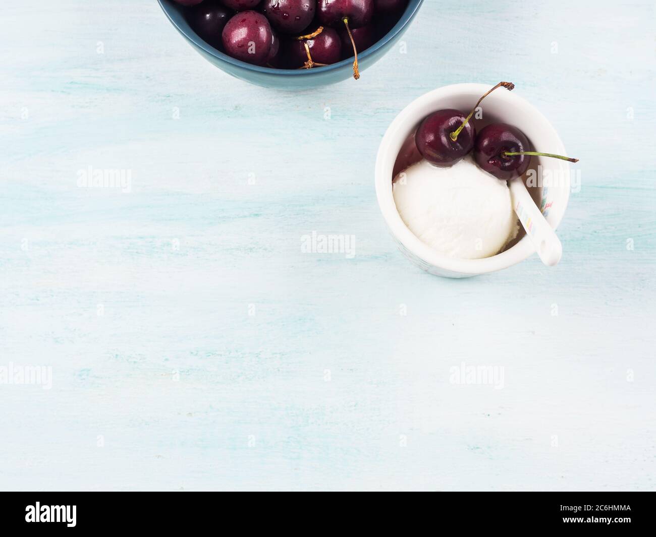 Frozen yogurt dessert in cup with cherries Stock Photo Alamy