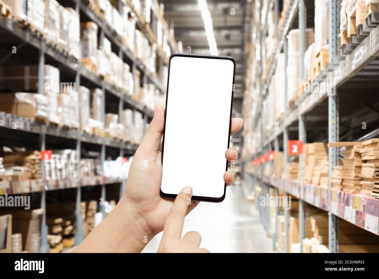 Download Close Up Hands Using Smartphone In Warehouse Industry Blur Background For Logistic Wholesale Storehouse Online Shopping Concept Mockup Blank White S Stock Photo Alamy