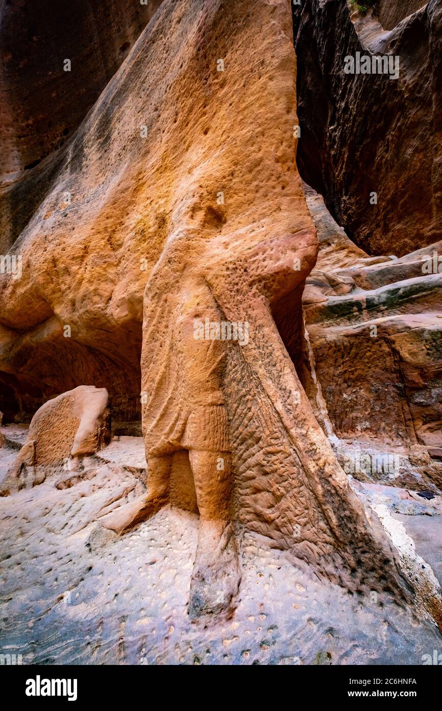 Underground ancient rock carving of a royal tomb in Petra, Jordan Stock Photo