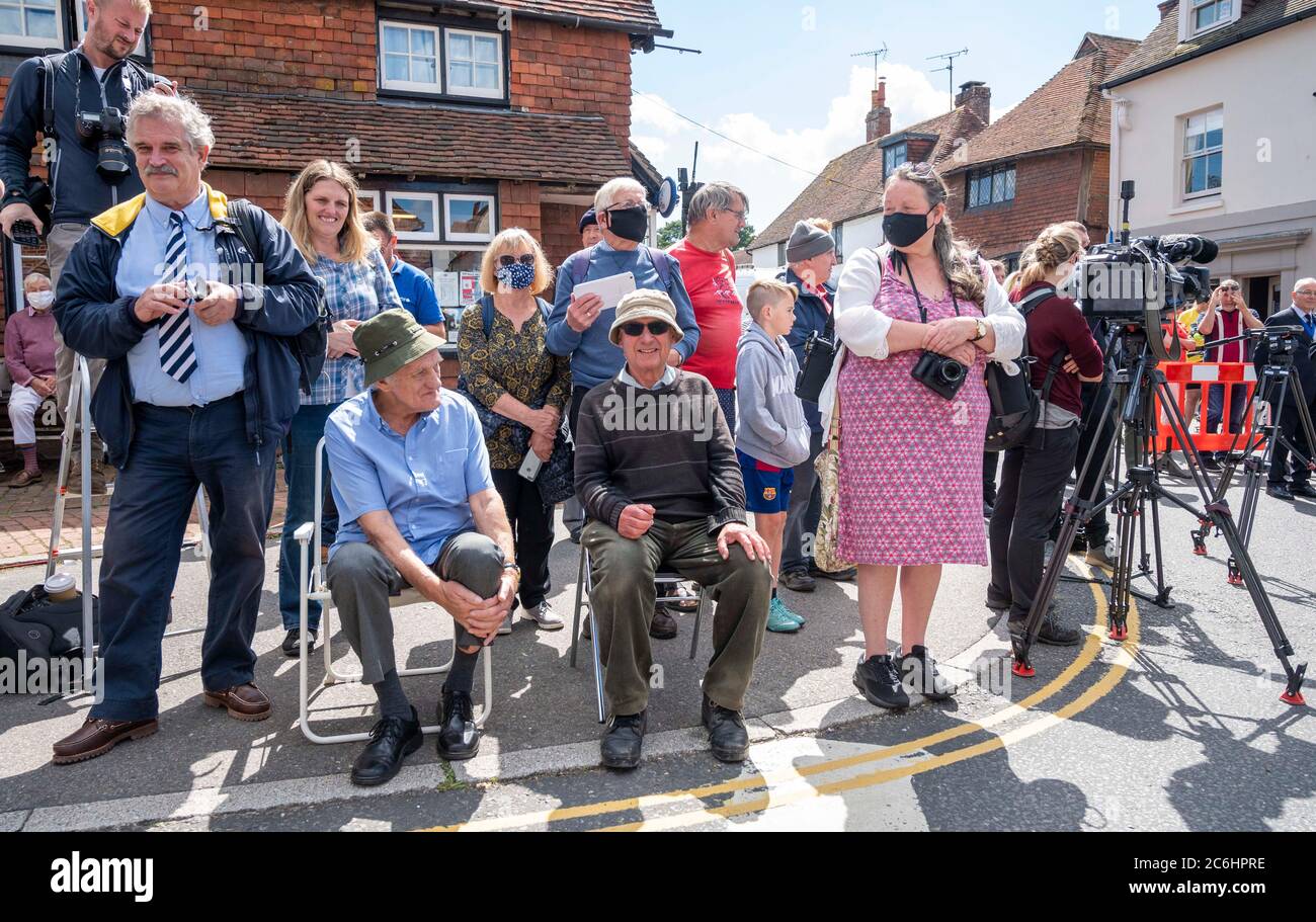 Ditchling Sussex UK 10th July 2020 - Residents line the streets of Ditchling as the funeral procession of Dame Vera Lynn passes by today . Singer Dame Vera Lynn who was known as the Forces Sweetheart died at the age of 103 on June 18th  : Credit Simon Dack / Alamy Live News Stock Photo
