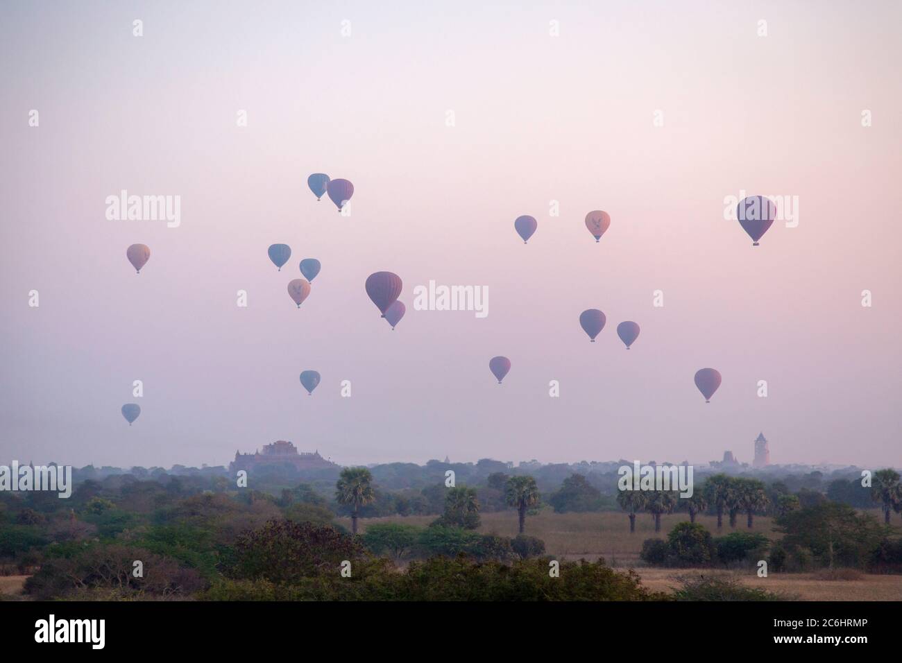Hot Air Balloons at Sunrise in Old Bagan, Myanmar Stock Photo