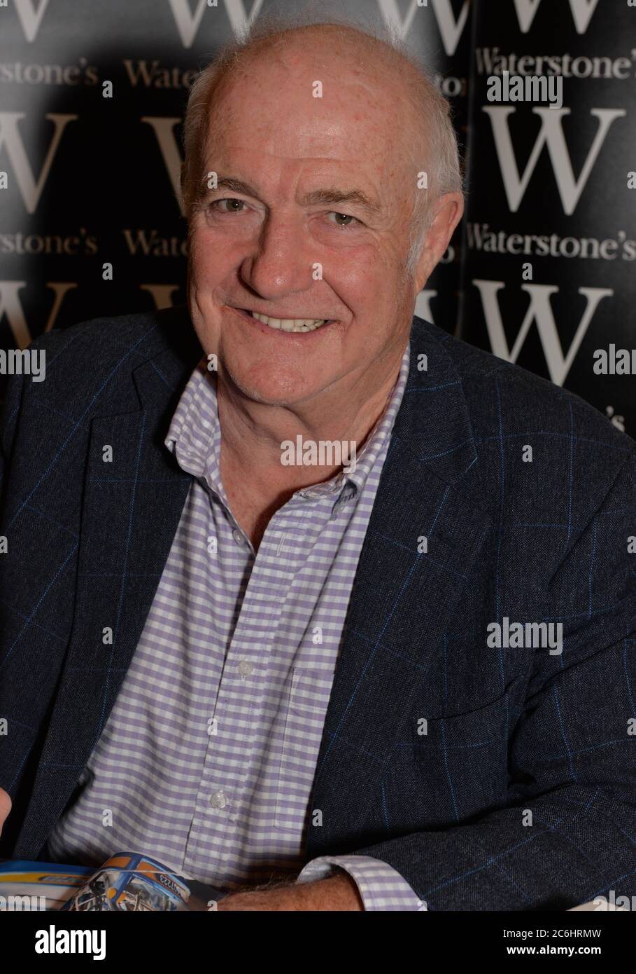 Rick Stein, British chef, restaurateur and presenter signs copies of Rick Stein's Secret France, a collection of 120 new recipes for real and simple F Stock Photo