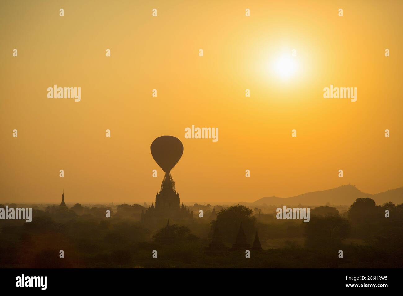 Hot Air Balloons at Sunrise in Old Bagan, Myanmar Stock Photo
