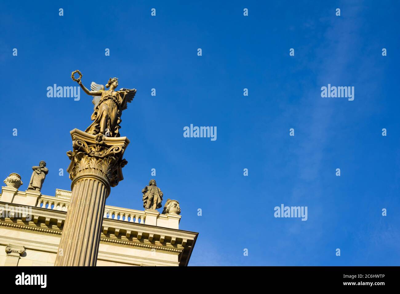 Golden statue of Muse, Source of inspiration, on column, Rudolfinum, Prague, Czech Republic / Czechia - sculpture of beautiful woman, renaissance revi Stock Photo