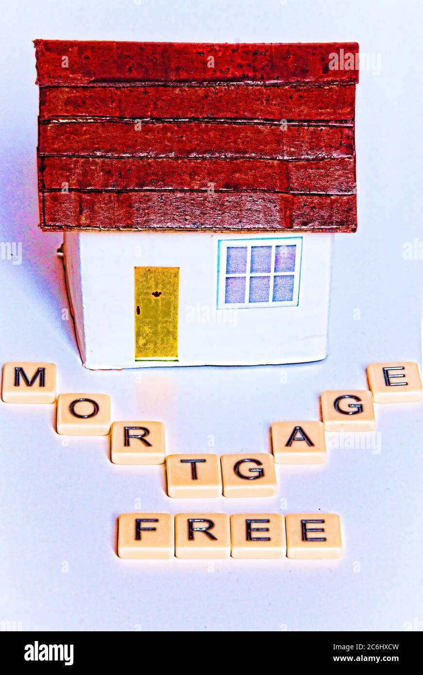 Financial concept image.toy house.  Words, mortgage free'.  dream  Idea  delight,  savings discipline rewarded, at last, acheivement, target, security Stock Photo