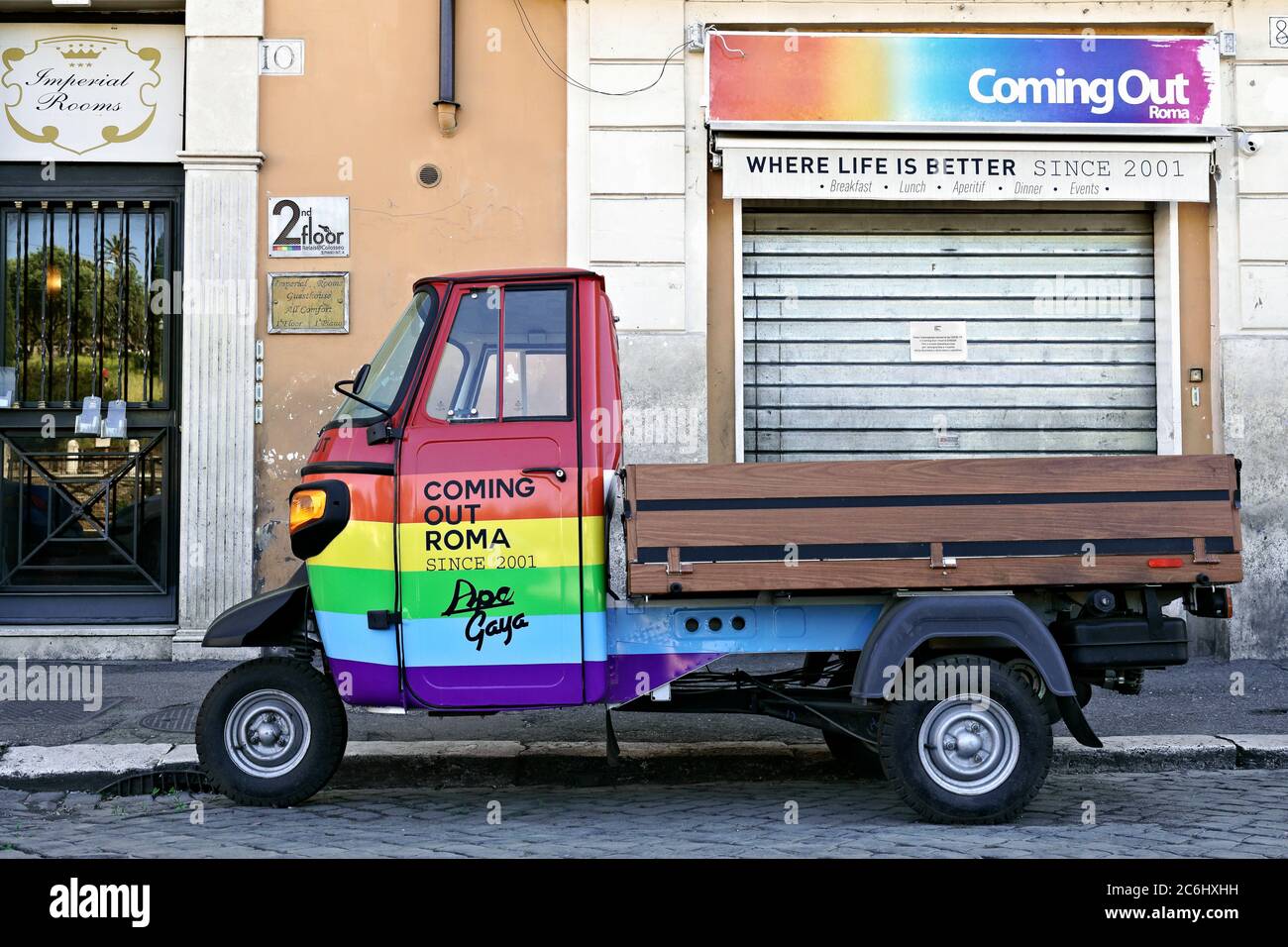 Gay bar closed during Coronavirus 19 lockdown. Rainbow Piaggio Ape parked in the Rome gay street deserted at the time of Covid 19. Italy, Europe, EU. Stock Photo