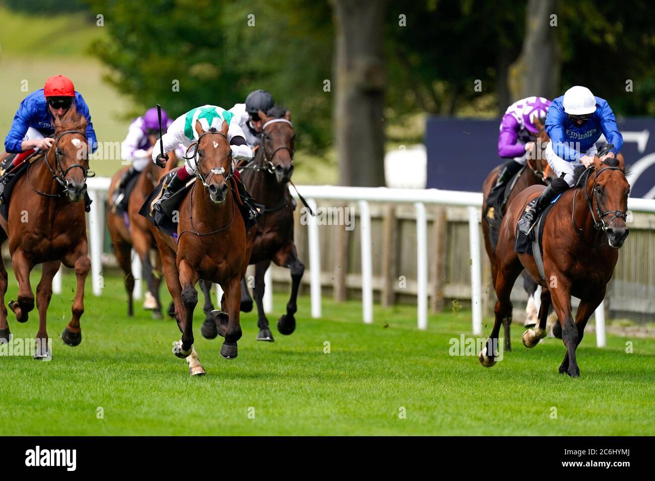 Oisin Murphy riding Youth Spirit (white/green star) win The bet365 British EBF Maiden Stakes during day two of The Moet and Chandon July Festival at Newmarket Racecourse. Stock Photo