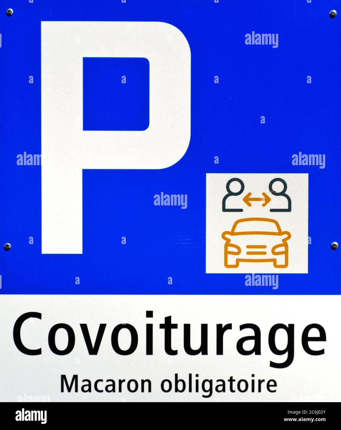 Traffic sign in French for car park for carpooling (covoiturage = car-sharing), Le Brassus, Vallée de Joux, Vaud, Switzerlandd Stock Photo