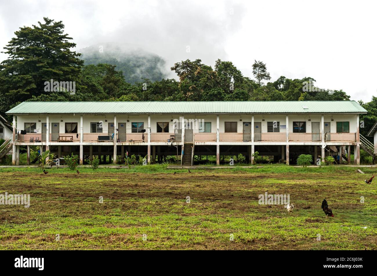A government sponsored longhouse of a resettlement project for the indigenous Penan people in a Penan Village near the Melinau River, Sarawak, Borneo, Stock Photo
